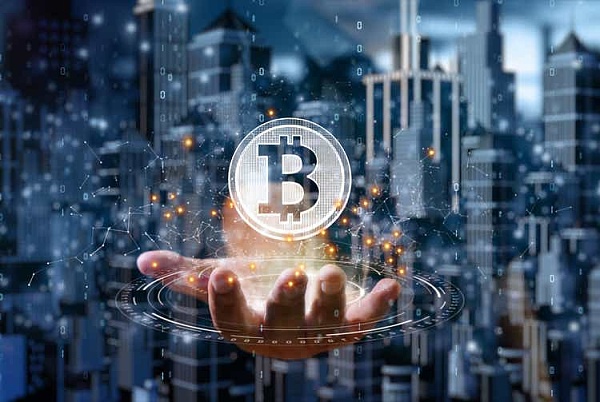 Businessman is holding a bitcoin as part of a business network, Cryptocurrency blockchain connection, Technology and financial investment background concept.